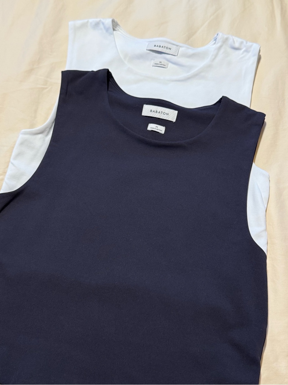Babaton Navy & White Layered Sleeveless Tank Top- $20 for both.